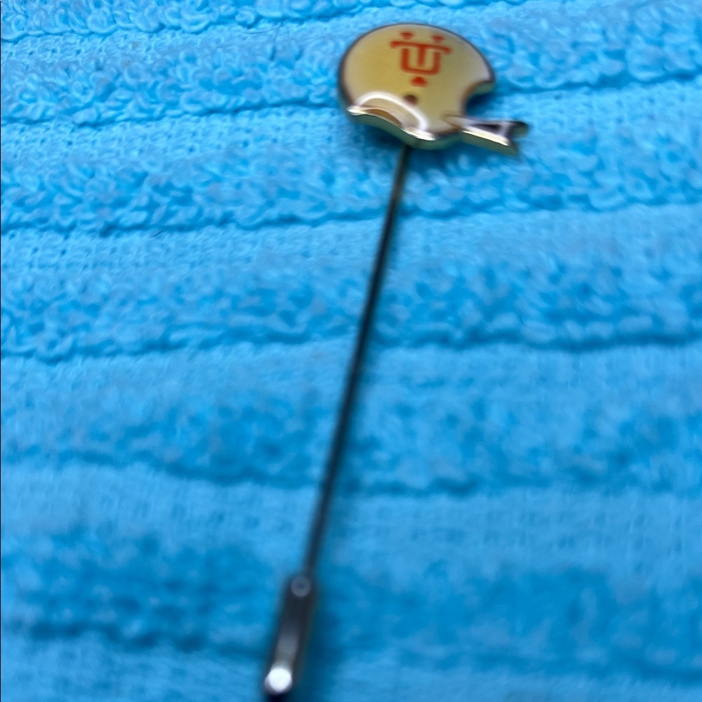Orange and white Enamel Pin.  From University of Tennessee.